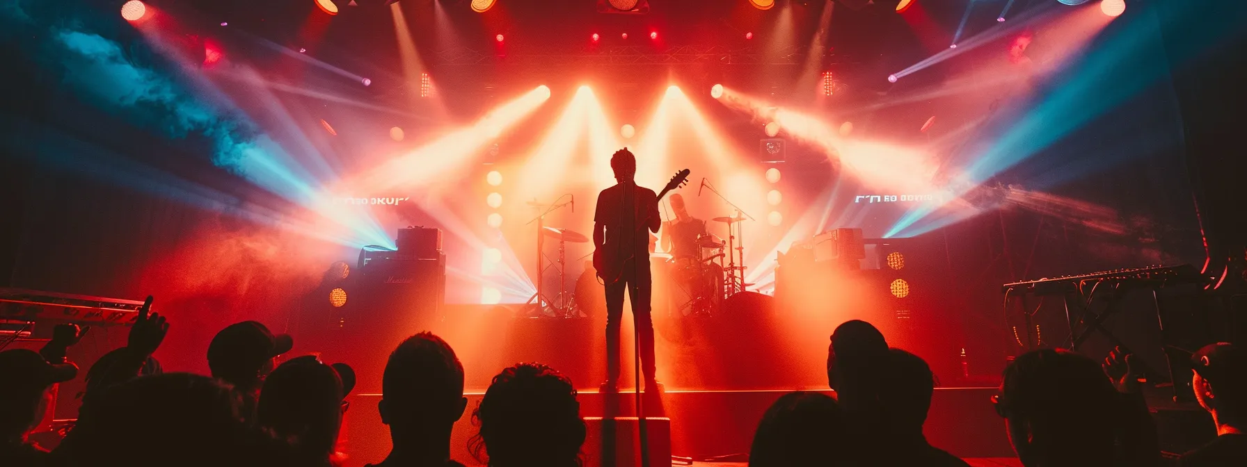 a musician standing confidently on stage, surrounded by vibrant visual elements that reflect their unique brand identity, engaging with a captivated audience.