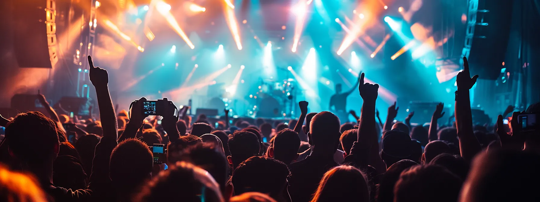 a vibrant concert crowd sways in unison under dramatic stage lights, embodying the energy and connection of a passionate music fanbase.